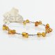 Amber bracelet with wire cognac